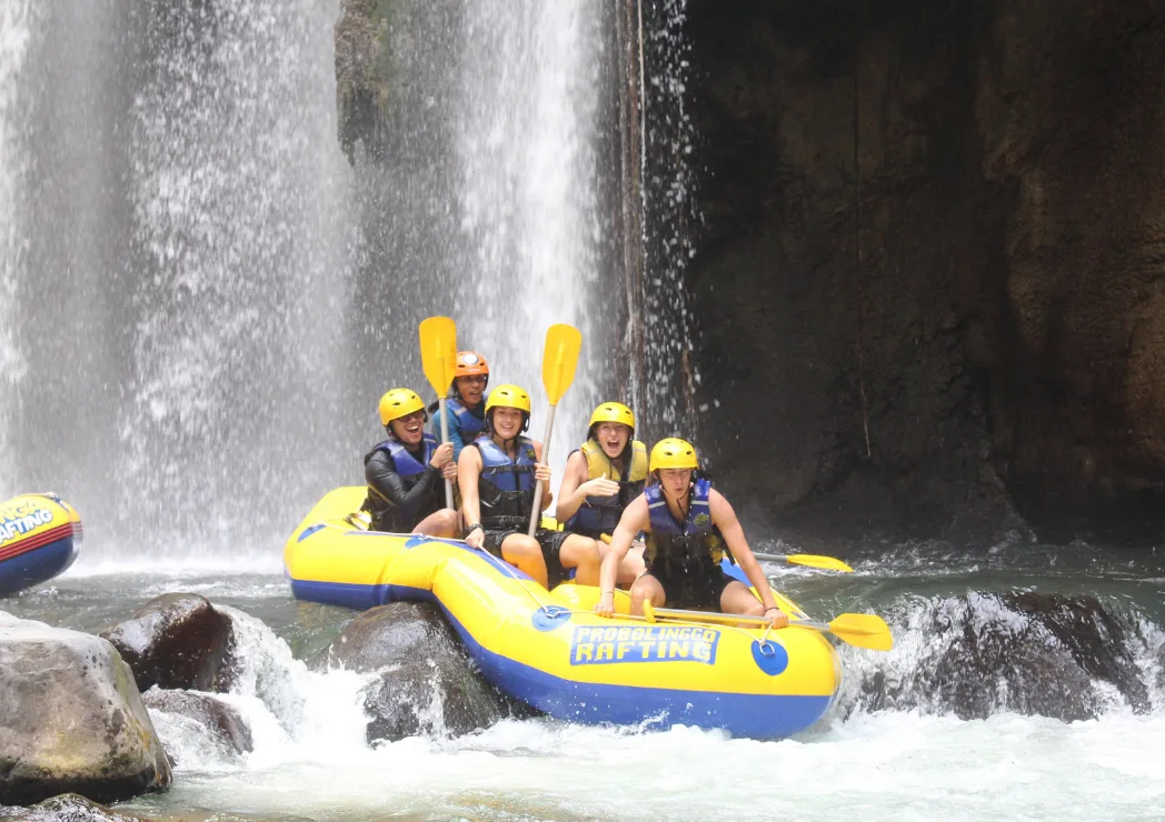 Group of people enjoying a thrilling adventure at Pekalen River
