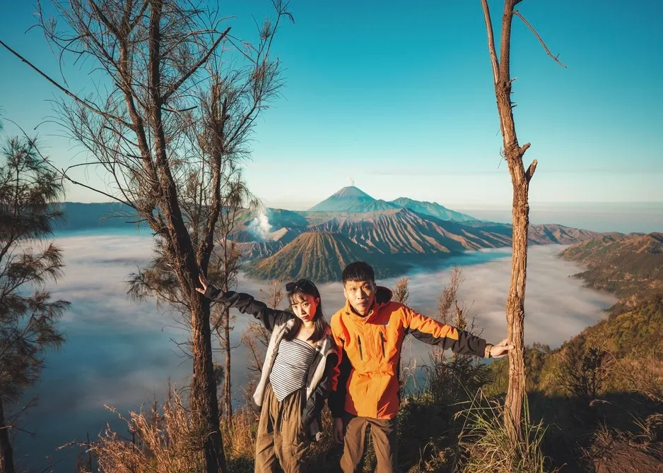 Couple During Bromo Sunrise And Madakaripura Waterfall Tour Package Couple During Bromo Sunrise And Madakaripura Waterfall Tour Package