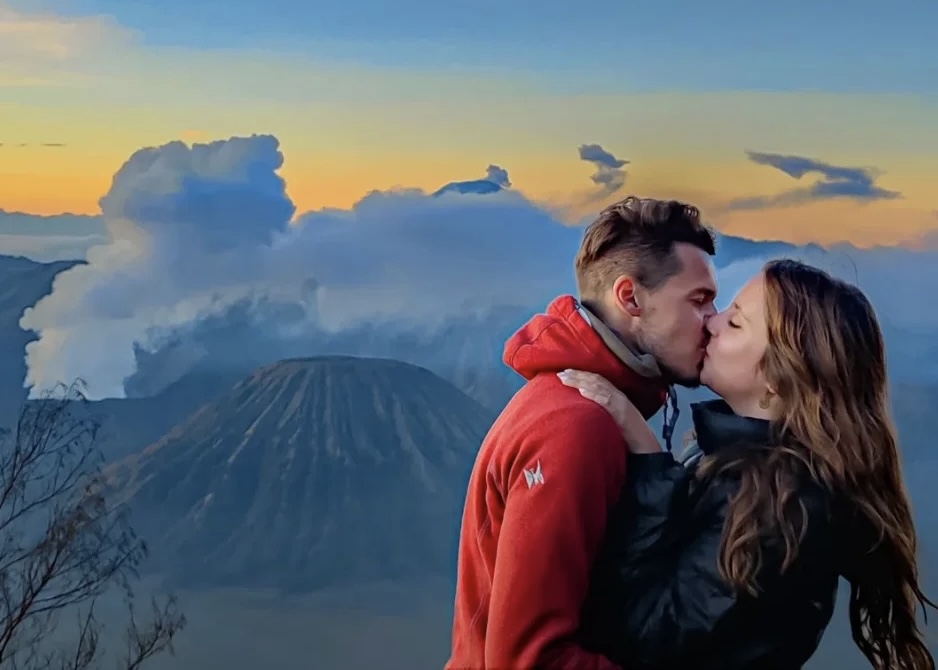 Couple Enjoying A Romantic Moment At Mount Bromo Couple Enjoying A Romantic Moment At Mount Bromo