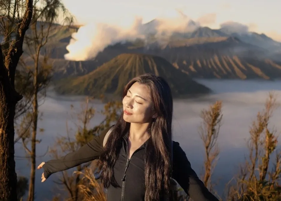 Tourist Enjoying Sunrise View On Mount Bromo Tourist Enjoying Sunrise View On Mount Bromo
